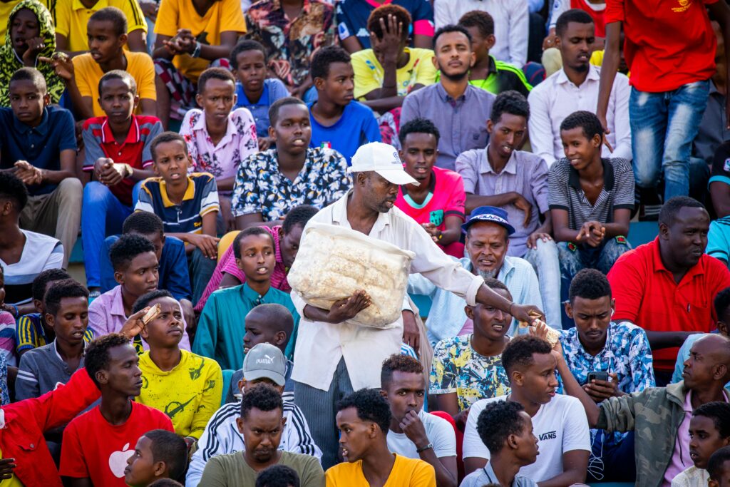 pexels-photo-9792865-9792865 Engaged crowd in Mogadishu stadium, capturing lively audience interaction.